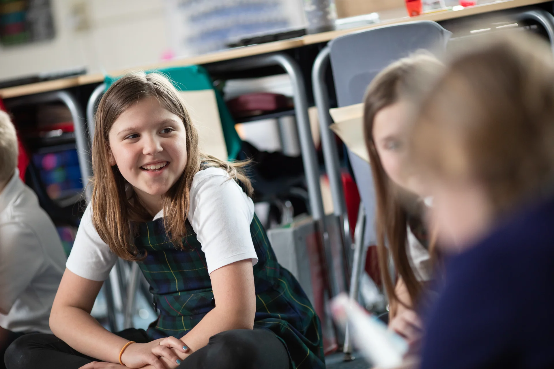 students smiling in classroom